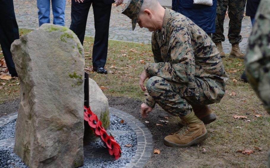 Maj. Gen. Russell A. Sanborn, the commander of Marines in Europe, looks at the memorial dedicated Thursday at the command?s Panzer Kaserne headquarters near Stuttgart, Germany. John Reese/U.S. Army