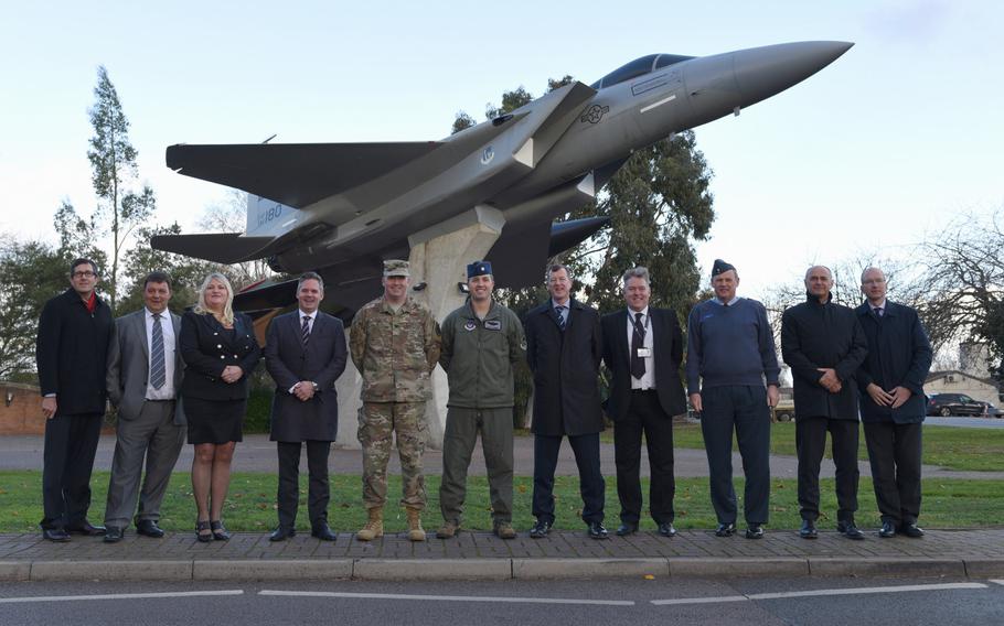 Leaders from RAF Lakenheath, the Defense Infrastructure Organisation, Air Force Civil Engineer Center, West Suffolk and Kier VolkerFitzpatrick pose for a photo at RAF Lakenheath, England, Monday, Nov. 19, 2018. The Defence Infrastructure Organisation awarded a contract worth 160 million pounds to ready RAF Lakenheath for two squadrons of F-35 Lightnings.