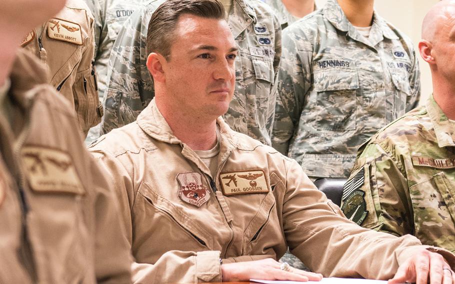 Lt. Col Paul Goossen and other servicemembers take part in a holiday conference call with President Donald Trump at Al Udeid Air Base, Qatar, Dec. 24, 2017. Goossen was removed from command of the 69th Bomb Squadron due to a loss of trust and confidence from his failure to maintain a professional workplace environment.