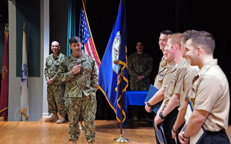 Vice Chief of Naval Operations Adm. Bill Moran congratulates sailors assigned to U.S. Naval Forces Central Command/U.S. 5th Fleet during a frocking ceremony at Naval Support Activity Bahrain, Tuesday, Dec. 4, 2018.