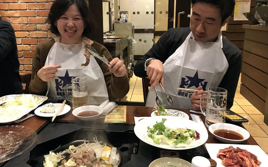 Sapporo Beer Garden serves the “Genghis Khan," a traditional Hokkaido barbecue of fresh lamb and vegetables cooked on your table in a metal skillet.
