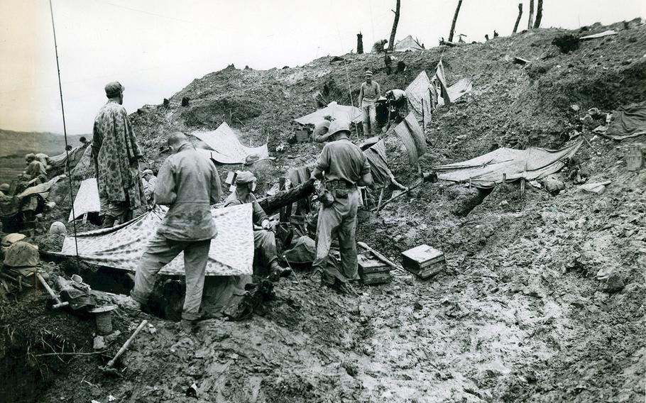 Marines camp on Sugar Loaf Hill during the Battle of Okinawa, May 26, 1945.