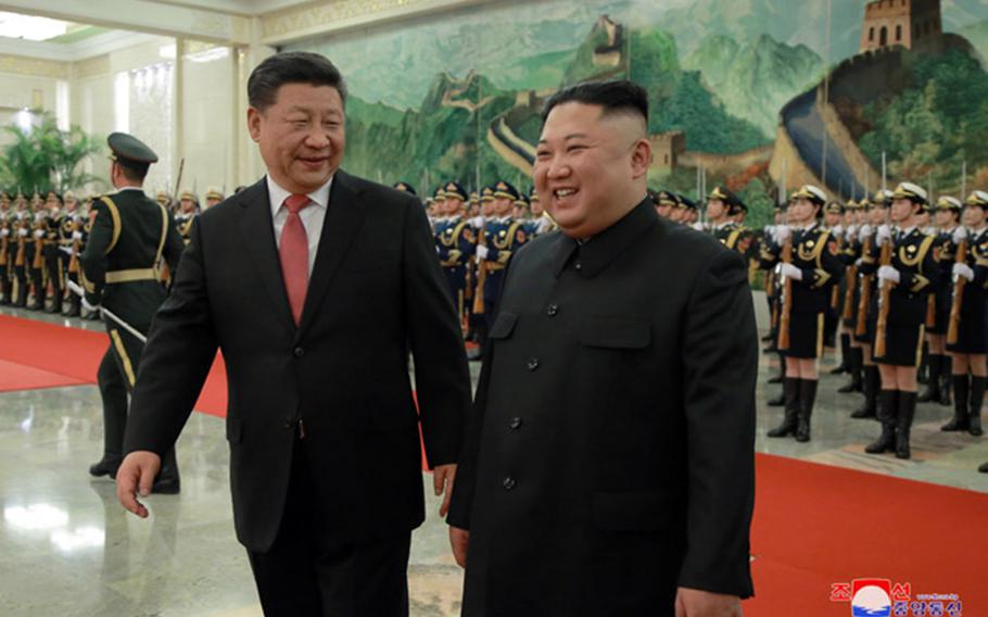 North Korean leader Kim Jong Un, right, meets with Chinese President Xi Jinping in Beijing, Tuesday, Jan. 8, 2019.
