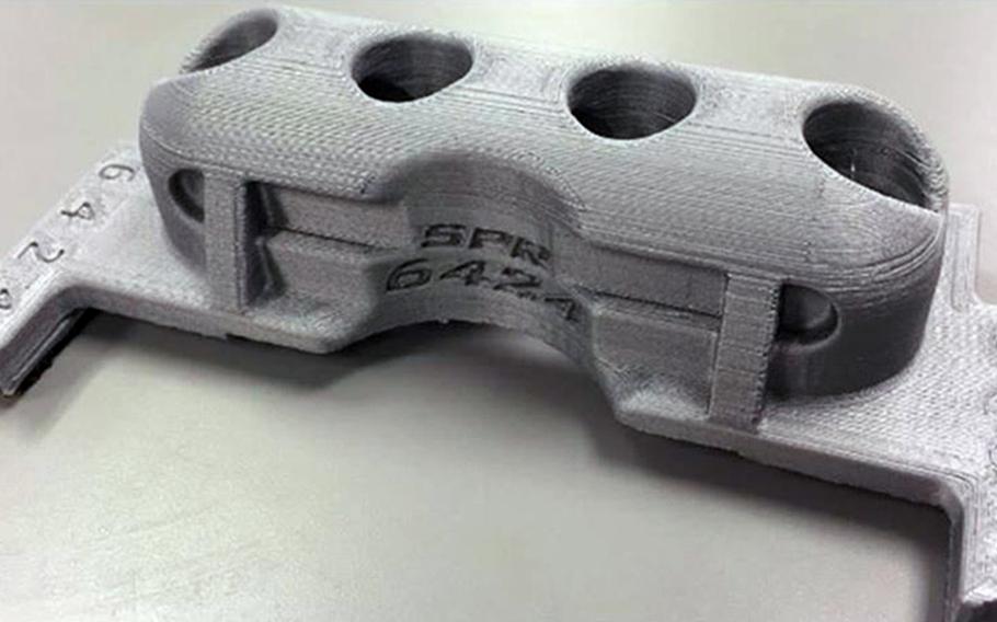 Students from Knob Noster High School near Whiteman Air Force Base, Missouri, designed this plastic cover for an important switch box inside the B-2 Spirit bomber. The cover now is used in all operational B-2s at Whiteman, as well as the aircraft's simulators.