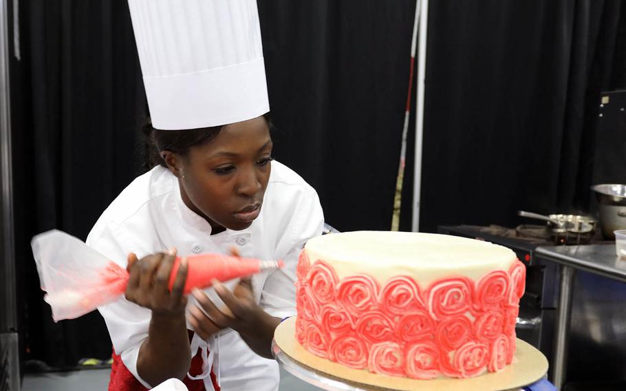 Sgt. Nickesha Carmichael, a culinary arts specialist from Fort Drum, N.Y., competed at the Joint Culinary Training Exercise at Fort Lee, Va., on March 9, 2019.