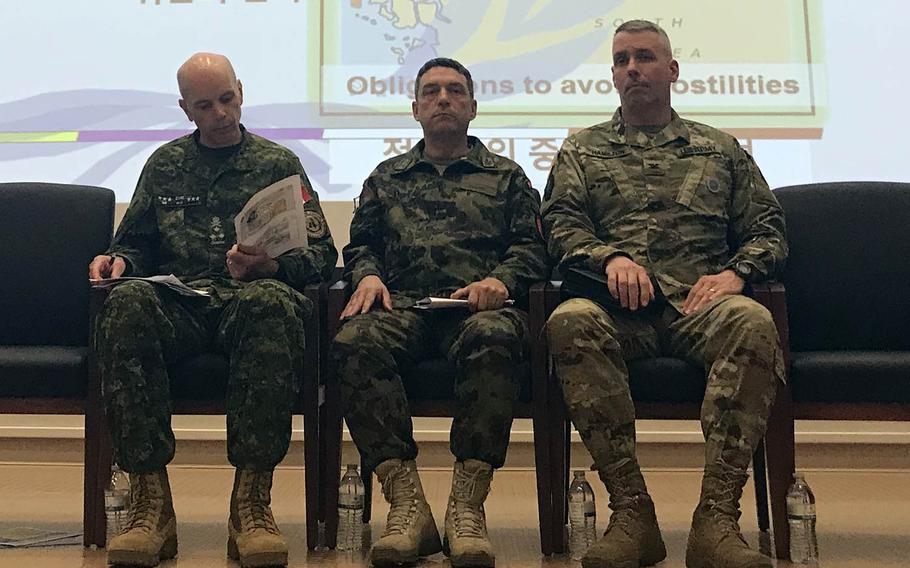Canadian Lt. Gen. Wayne Eyre, left, deputy commander of the United Nations Command; Maj. Gen. Patrick Gauchat, center, head of the Swiss delegation to the Neutral Nations Supervisory Commission; and U.S. Army Col. Burke Hamilton, secretary of the UNC's military armistice commission, speak to reporters at the UNC headquarters on Camp Humphreys, South Korea, Thursday, April 18, 2019.