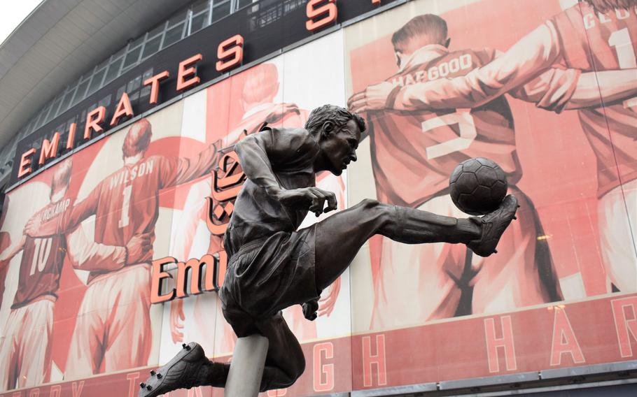 A statue of former Arsenal star Dennis Bergkamp is one of many such statues arranged around the soccer team's London home, Emirates Stadium.