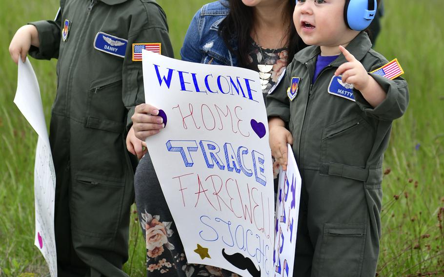 Family members of redeploying airmen with the 510th Fighter Squadron, 31st Fighter Wing, Aviano Air Base, Italy, excitedly await the arrival of their loved ones at Aviano's airfield, on Tuesday, April 30, 2019.