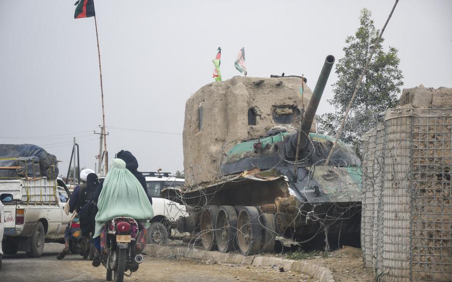 A small checkpoint built around the wreck of a Soviet tank on the outskirts of Lashkar Gah, in Helmand province, April 14, 2019. Almost half of Afghan troops killed or wounded last year were defending small checkpoints, sometimes manned by as few as four or five soldiers.