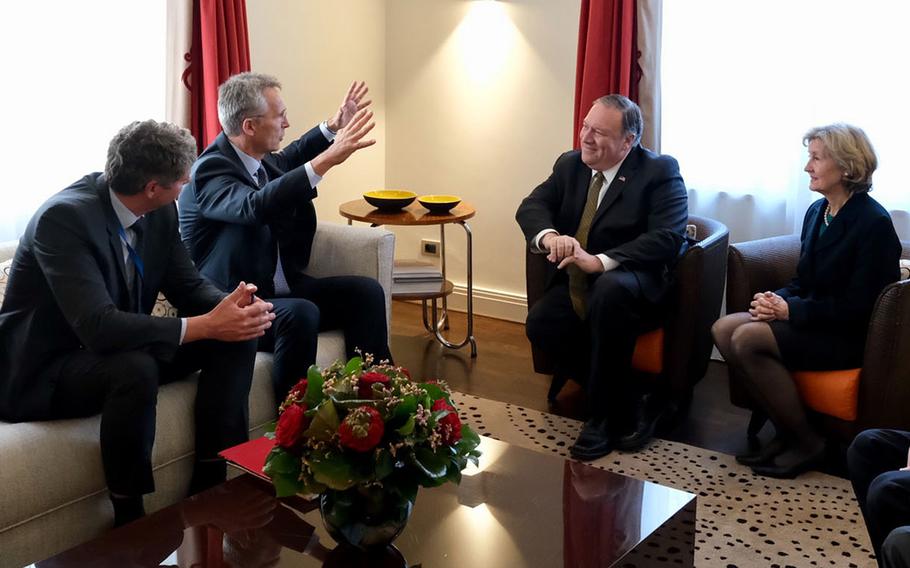 NATO Secretary-General Jens Stoltenberg, 2nd from left, talks to Secretary of State Mike Pompeo and NATO ambassador Kay Bailey Hutchison, at NATO headquarters in Brussels, Belgium, Monday, May 13, 2019. Stoltenberg and Pompeo convened to discuss the Trump administration?s concerns over Iran.