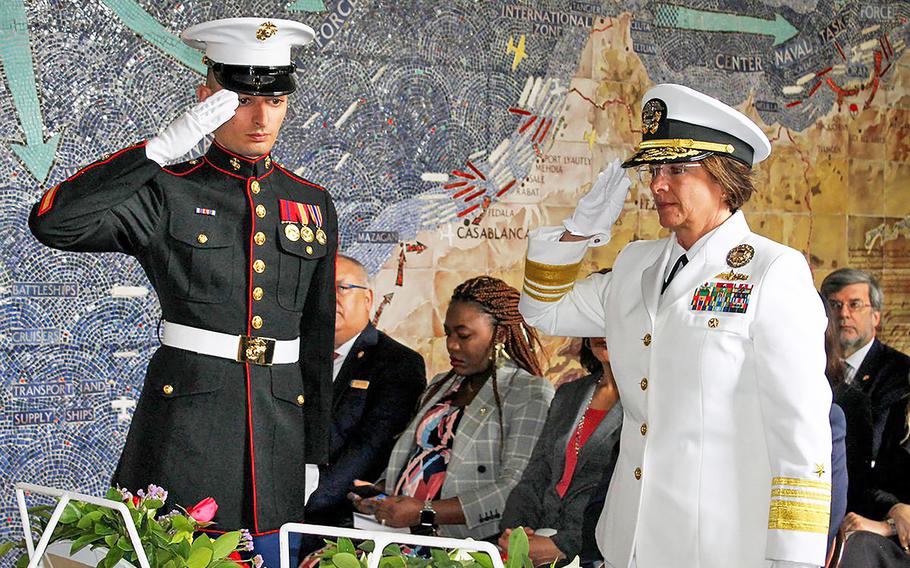 Vice Adm. Lisa Franchetti, right, lays a memorial wreath on Monday May 27, 2019 at the North Africa American Cemetery in Tunis, Tunisia where she honored the thousands of soldiers who died there during World War II.