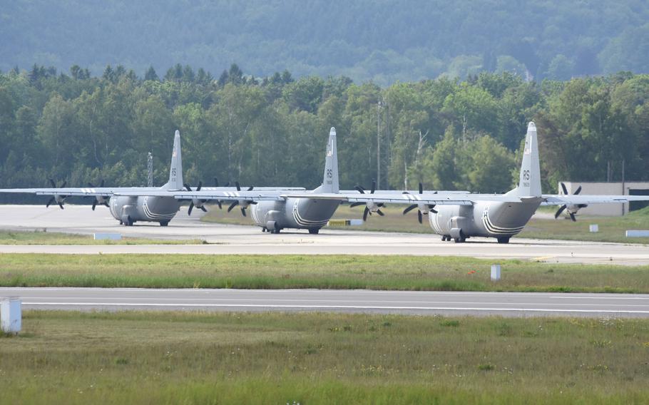 Three C-130J from the 37th Airlift Squadron at Ramstein Air Base, Germany, taxi down the runway Wednesday, May 29, 2019, prior to taking off for Normandy, France. Four planes and about 40 personnel from the squadron will participate in events next week marking the 75th anniversary of D-Day.
