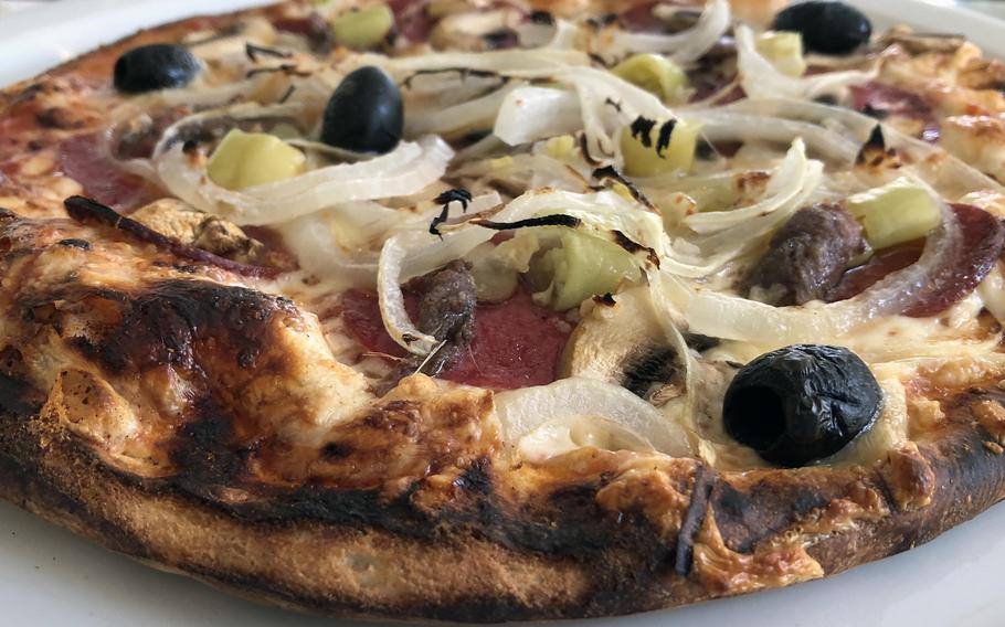 A pizza rustica at Bistrorante Da Adriana in Kaiserslautern, Germany. While the toppings -- salami, pepperoni, chilis, onions, olives and anchovies -- might not be to everyone's taste, it was delicious.