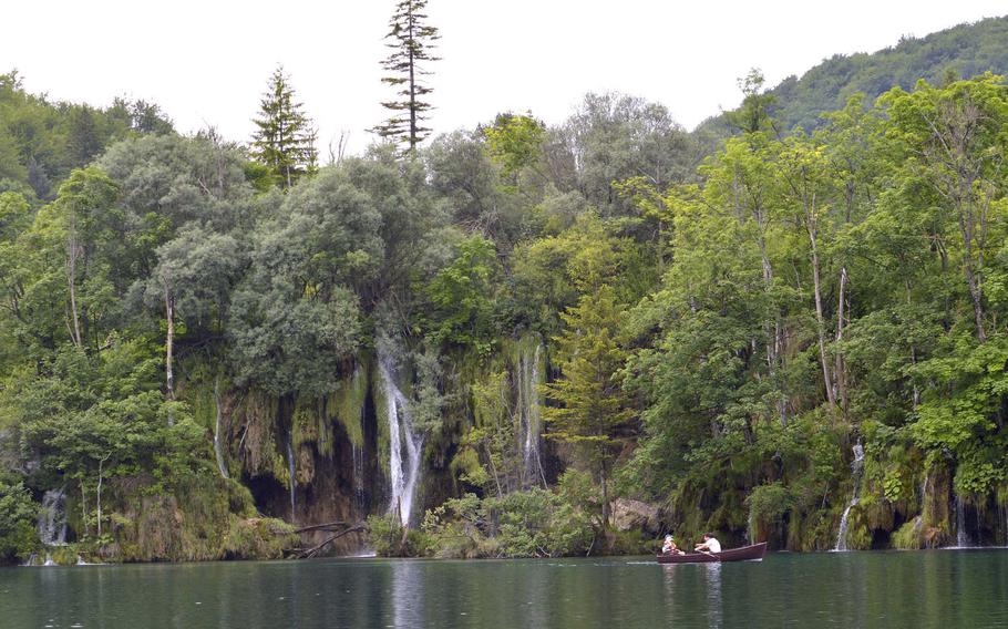 View of one of the lakes and waterfalls at Plitvice Lakes National Park, in Croatia. The park, an area of exceptional biological and geological diversity, is visited by more than a million people annually.