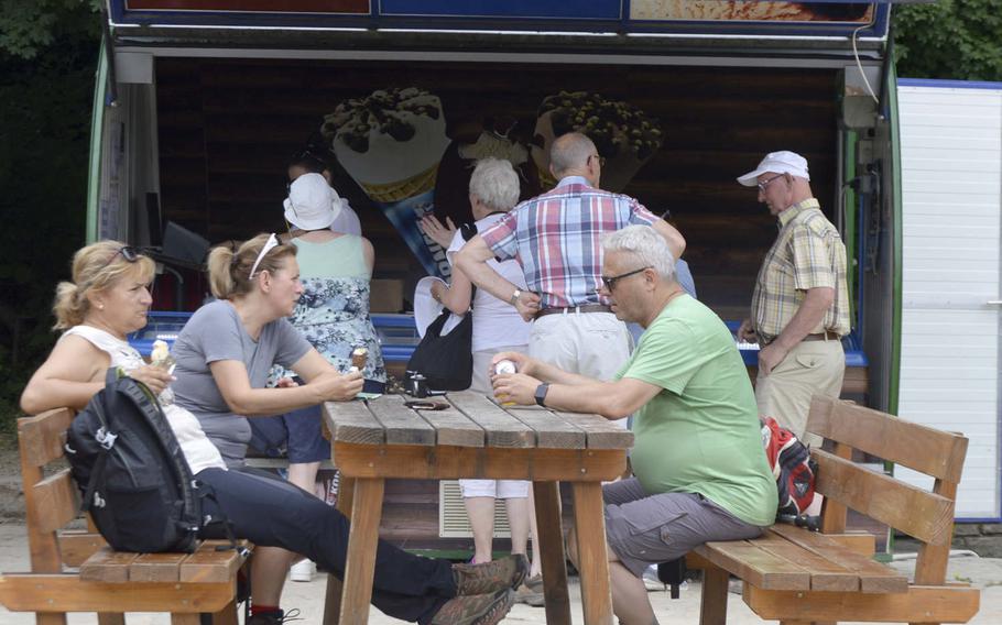People enjoy ice cream and the chance to rest their feet at Plitvice Lakes National Park in Croatia. It takes six to eight hours to walk around the park on the ‘K’ trail, but there are rest areas, offering food and drink, on the way.