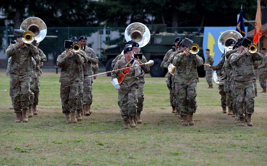 The 13th Army Band of the Florida National Guard marches across the Daenner Kaserne parade field at the beginning of the 21st Theater Sustainment Command change of command ceremony in Kaiserslautern, Germany, Wednesday, July 31, 2019. Maj. Gen. Christopher O. Mohan took command of the unit from Maj. Gen. Steven A. Shapiro at the ceremony.