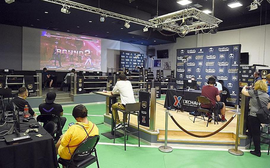People compete at the Street Fighter V tournament at Vilseck, Germany, Saturday, Aug. 17, 2019.