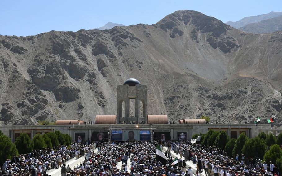 People gather at the tomb of Ahmad Shah Massoud in Panjshir, Afghanistan, on Thursday, Sept. 5, 2019, to listen to Massoud?s son as he launches a new anti-Taliban movement.