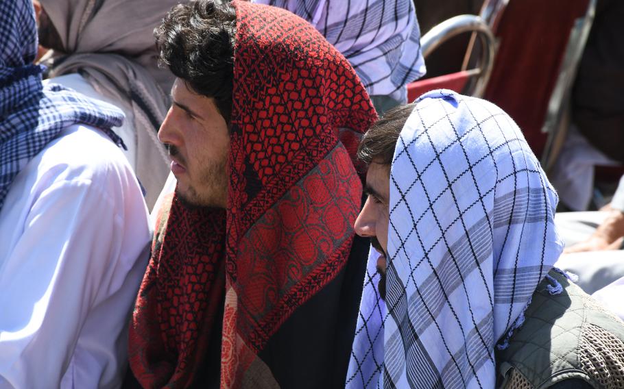 Two supporters listen to Ahmad Massoud, son of slain Northern Alliance leader Ahmad Shah Massoud, as he launches a new anti-Taliban movement in Panjshir, Afghanistan, on Thursday, Sept. 5, 2019.