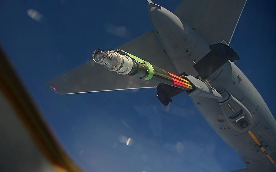 A C-17A Globemaster III aircrew assigned to the 3rd Airlift Squadron, Dover Air Force Base, Del., conducts air refueling training with a KC-46A Pegasus near Fairchild Air Force Base, Wash, March 22, 2019 .