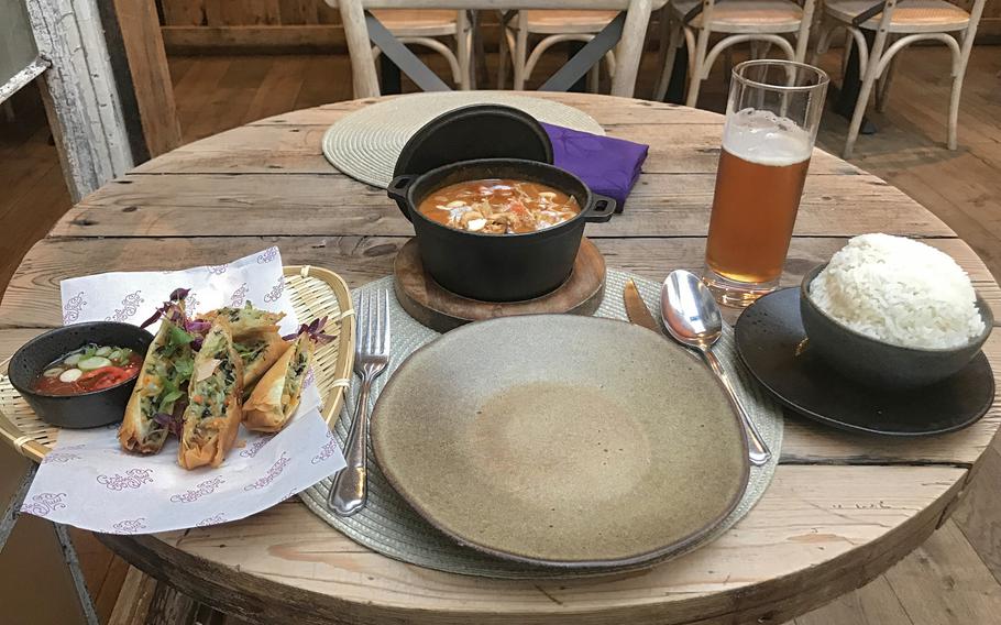 Massaman curry with beef and jasmine rice and spring rolls at the Giggling Squid is enough to feed two.