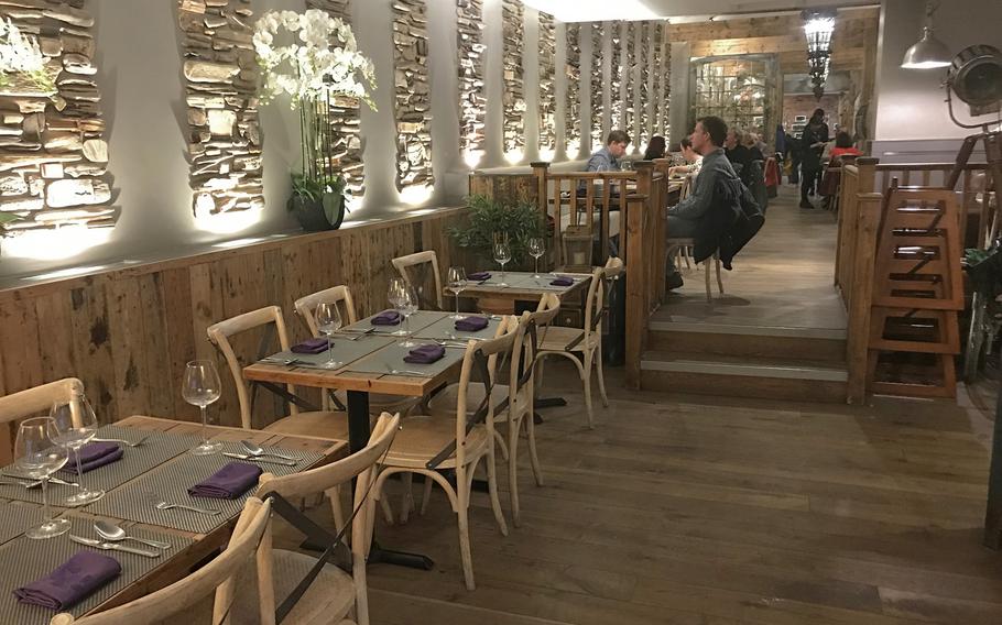 As you enter the Giggling Squid, you notice the modern, organic feel of the place.