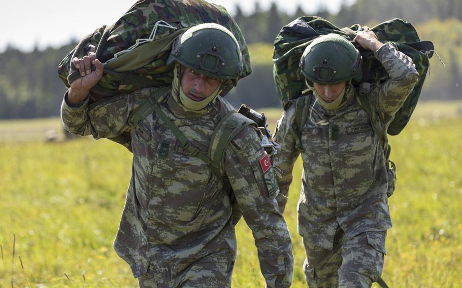 Turkish Armed Forces soldiers maneuver into position after an airborne training jump Sept. 18, 2019. U.S. lawmakers have proposed sanctions on Turkey that would ban military assistance and prohibit the sale of any equipment to the Turkish armed forces in response to its invasion of Syria.