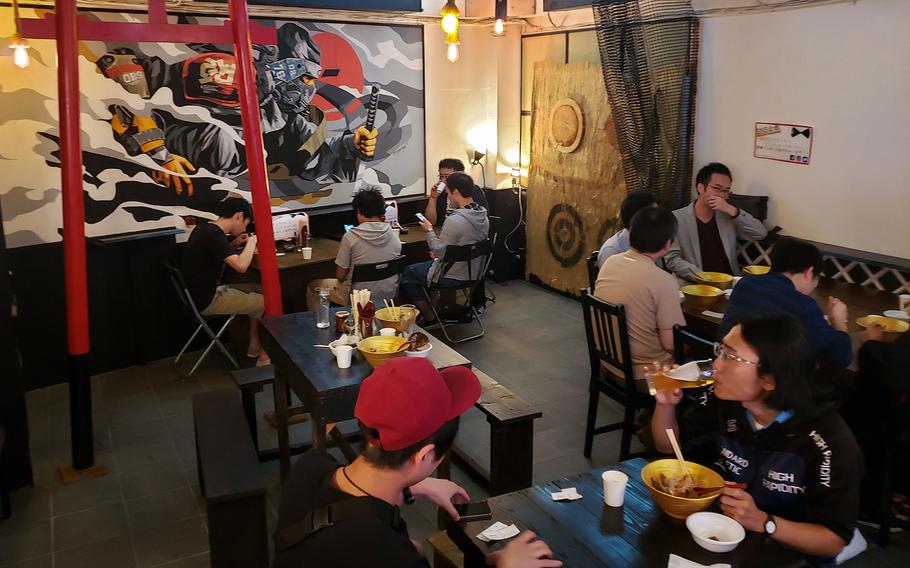 The ninja theme flows over you like a black wave at Ninja Cafe & Bar in Tokyo. The food arrives in the shape of throwing stars.
