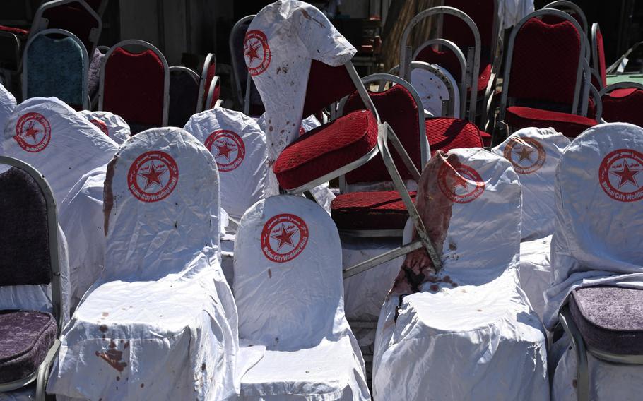 Blood-stained chairs are stacked outside the Dubai City Wedding Hall in Kabul on Aug. 18, 2019, a day after a suicide attack at the venue killed dozens of people. More Afghans were killed in the third quarter of 2019 than any comparable time period in the past decade, according to a U.N. report released Oct. 17, 2019.