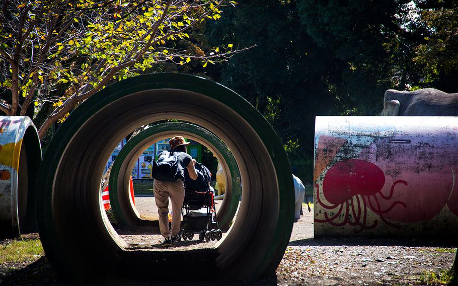 A mother and child explore a play area at Hamura Zoo in western Tokyo, Oct. 9, 2019. Theron Godbold/ Stars and Stripes