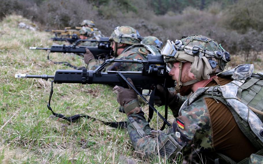 German soldiers provide suppressive fire during NATO exercise Allied Spirit X in Hohenfels, Germany, in April 2019. Germany will meet the NATO target of spending 2% of economic output on its military by 2031, Defense Minister Annegret Kramp-Karrenbauer said Thursday, Nov. 7, 2019.