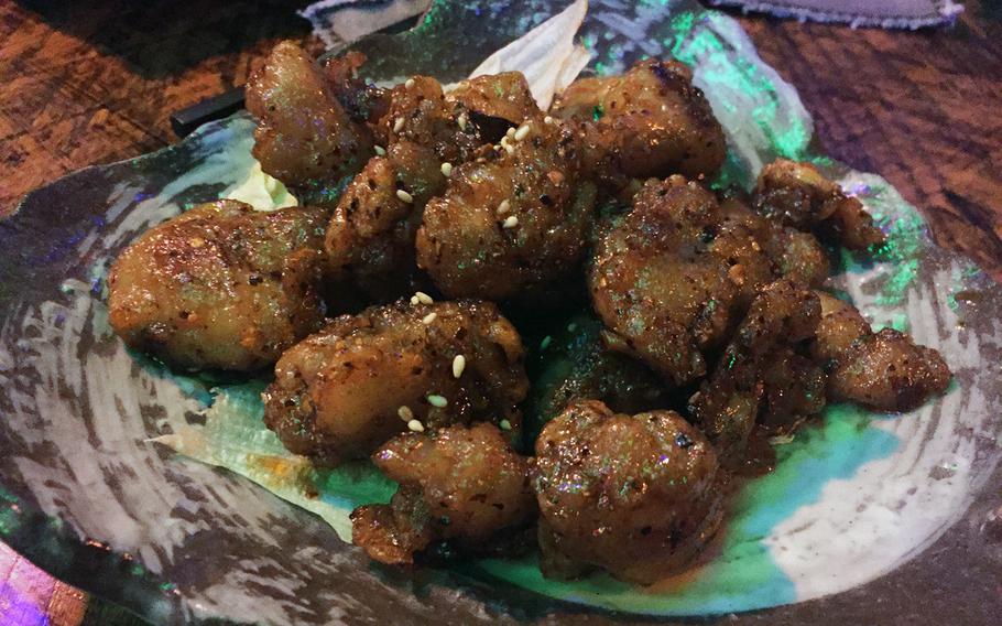 The stir-fried chicken with cashew nuts from Ryu's Dining in Okinawa, Japan, is crispy on the outside and juicy on the inside.