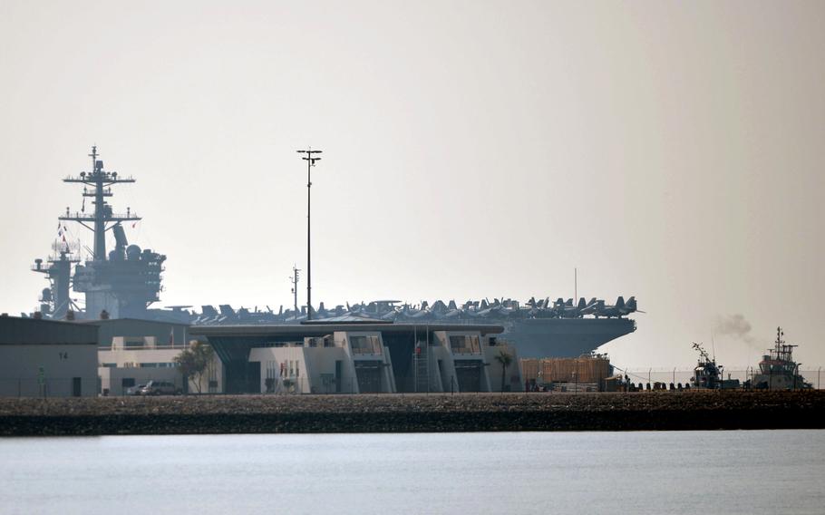 The USS Abraham Lincoln arrives at Khalifa Bin Salman in Hidd, Bahrain, for a liberty port visit on Nov. 26, 2019. Lincoln and crew first transited the Strait of Hormuz into the Persian Gulf on Nov. 19 after operating in the Arabian Sea since May.