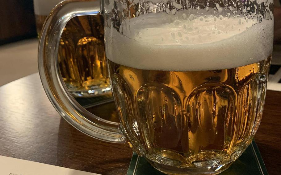 A half-liter of draft Pilsner Urquell beer is a good start to a meal in the Na Spilce restaurant in Pilsen, Czech Republic. The first blonde, clear pils beer was brewed in this town in 1842.