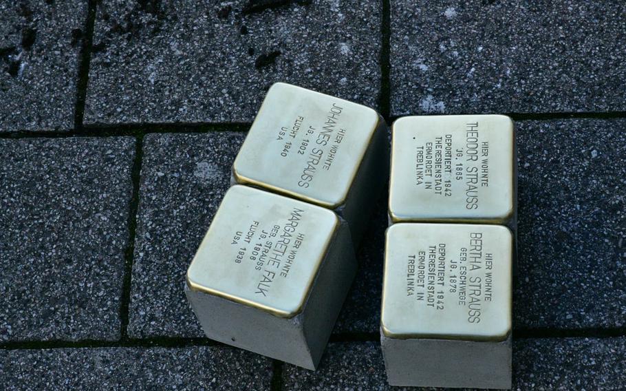 Four of the Stolpersteine that were laid outside a business on Eisenbahnstrasse in Kaiserslautern, Germany on Wednesday, February 5, 2020 in memory of the Strauss family. The parents, Theodor and Bertha, were deported to Theresienstadt in what is now the Czech Republic and later murdered in Treblinka in Poland, but their children managed to flee to the U.S. and survived the Holocaust.