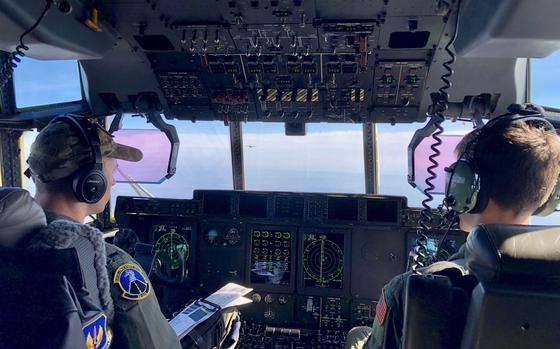 Lt. John Kornahrens and Maj. Erik Svendsen fly their C-130J  back to Ramstein Air Base after a training flight involving a parachute drop at NATOs facility at Chievres, Belgium, on Thursday, March 26, 2020. The training involved aggressive low-level flying to simulate a combat drop. The Super Hercules is flying in formation with another C-130J from the 37th Airlift Squadron.

