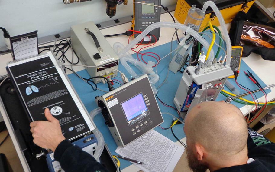 A biomedical equipment specialist conducts depot-level maintenance on a ventilator at Tobyhanna Army Depot, Pa., March 23, 2020.