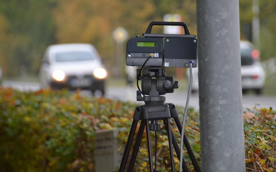 A speed camera enforces the speed limit on a German roadside. New traffic regulations that take effect Tuesday, April 28, 2020, in Germany say drivers who are caught exceeding the speed limit in town by 13 mph or by 16 mph on the highway, can lose their license for a month.