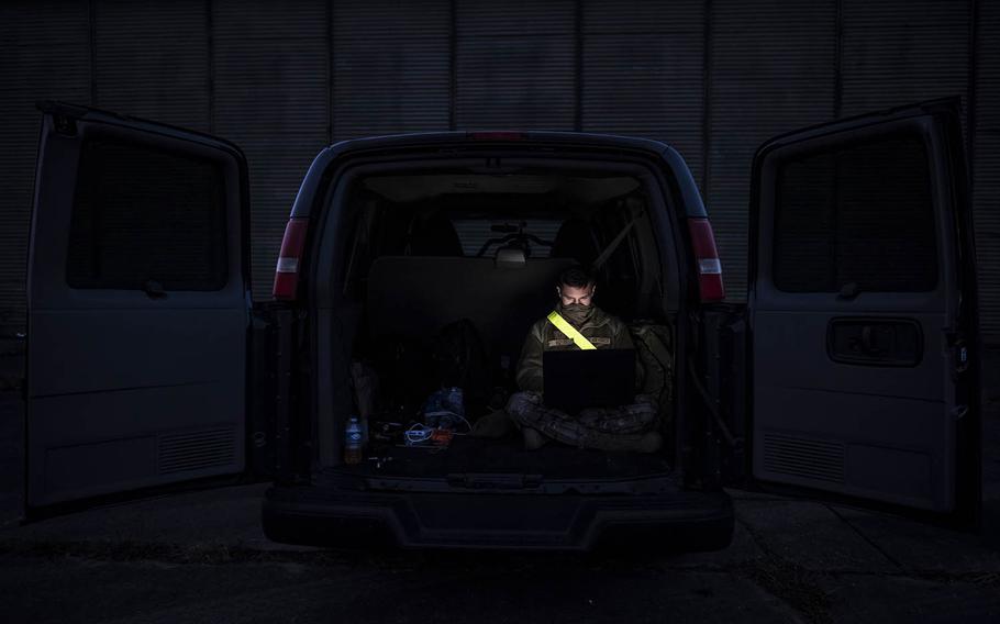 Air Force Staff Sgt. Devin Boyer, a photojournalist for the 86th Airlift Wing at Ramstein Air Base, Germany, reviews his imagery during exercise Frozen Defender in Grostenquin, France, Jan. 16, 2020.
