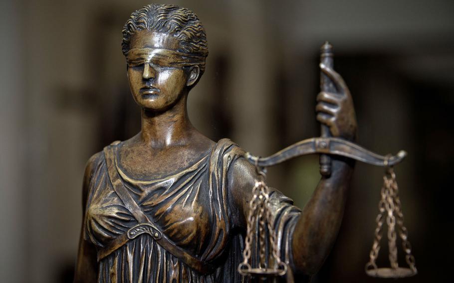A statue of Lady Justice at the Air Force Judge Advocate General's School at Maxwell Air Force Base, Ala. The Air Force???s top lawyer says the service needs to reform its judicial system to address racial inequities.
