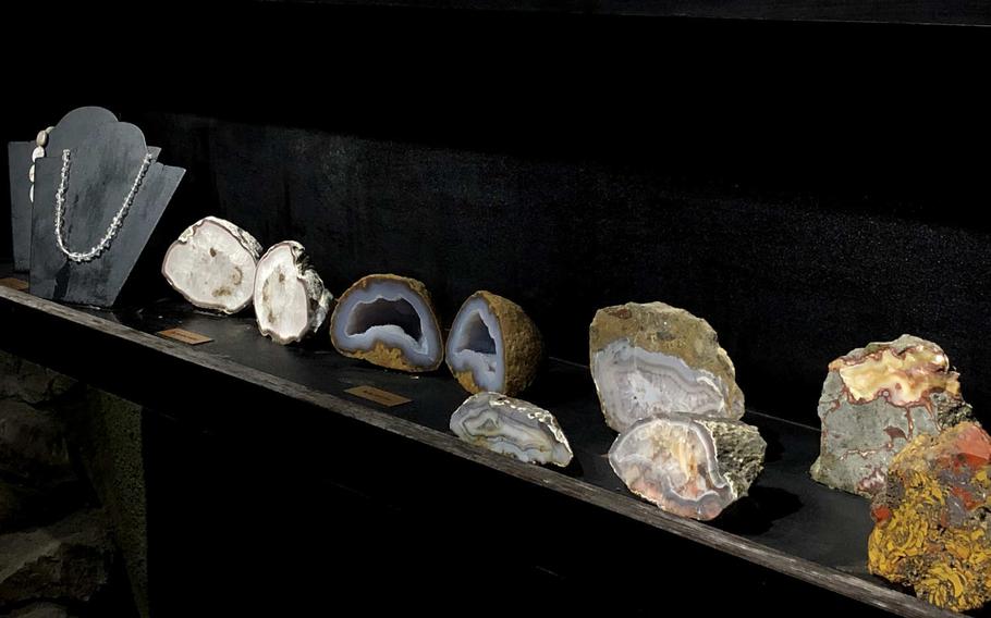 A display at the end of the tour of the Steinkaulenberg mine in Idar-Oberstein, Germany, shows the types of gems that can be found there.