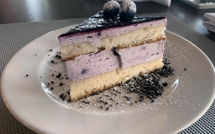 A slice of black raspberry cake is a tasty dessert option at the Yachtova restaurant in Mikolajki, Poland.