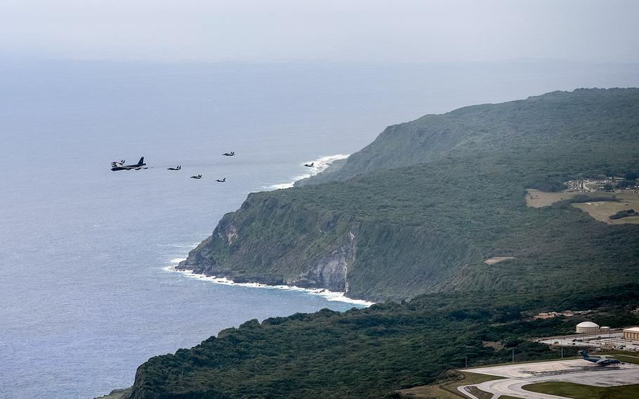 Aircraft fly in formation over Andersen Air Force Base, Guam, during the Cope North exercise, Feb. 19, 2020.