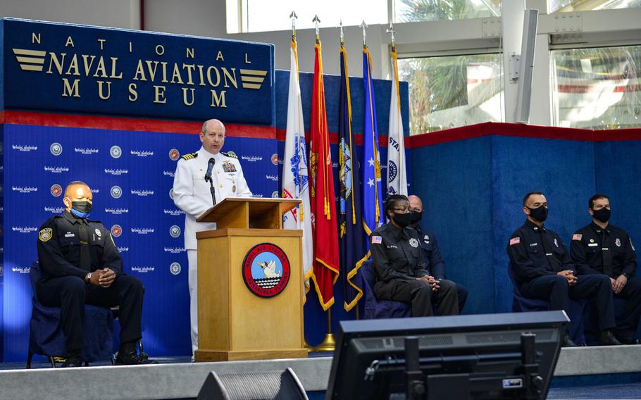 Capt. Tim Kinsella, commanding officer of Naval Air Station Pensacola, Fla., delivers remarks during an awards ceremony at the National Naval Aviation Museum at Naval Air Station Pensacola, June 16, 2020, to recognize personnel who responded to the Dec. 6, 2019 terrorist attack at the installation.