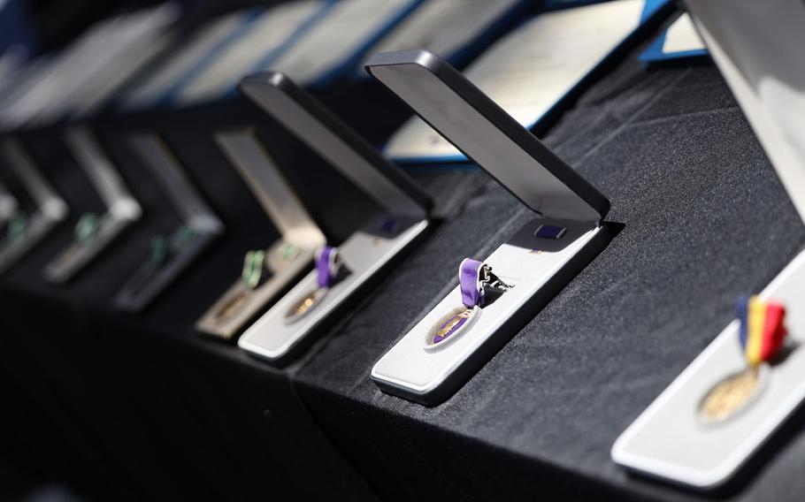 Medals are displayed prior to being awarded to 12 service members and federal employees, who were recognized for their bravery and selflessness during the Dec. 6 shooting at Naval Air Station Pensacola, Fla., June 19, 2020.