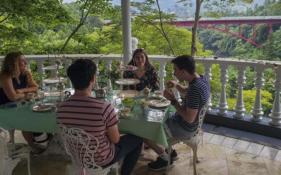 Visitors from Yokota Air Base in western Tokyo enjoy tea time at the naearby Rose Town Tea Garden in Ome, Japan, June 24, 2020.