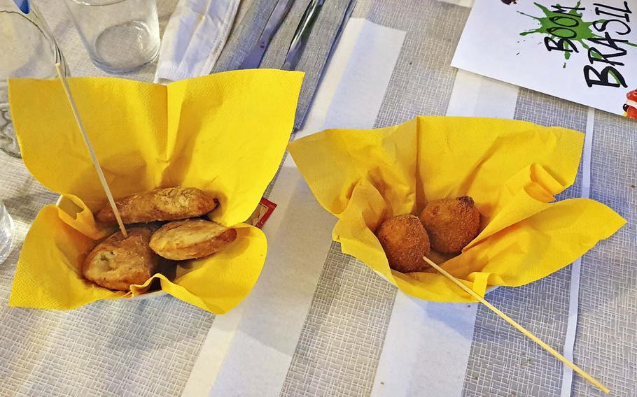 Appetizers at Boom Brasil, a recently opened restaurant in Sacile, Italy. On the left, pastelzinho di carne, which are a type of meat-filled empanadas, and on the right, coxinha de frango, which are fried, shredded chicken-filled dumplings.