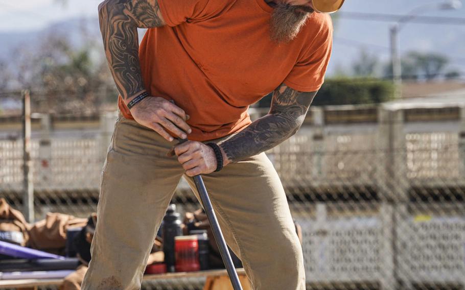 Marine veteran Kelly Murphy, left, competes on the reality show Tough As Nails, which debuts on CBS television on Wednesday, July 8, 2020. The competition celebrates Americans who roll up their sleeves and get their hands dirty to accomplish a task and keep the U.S. running, CBS says on its website.