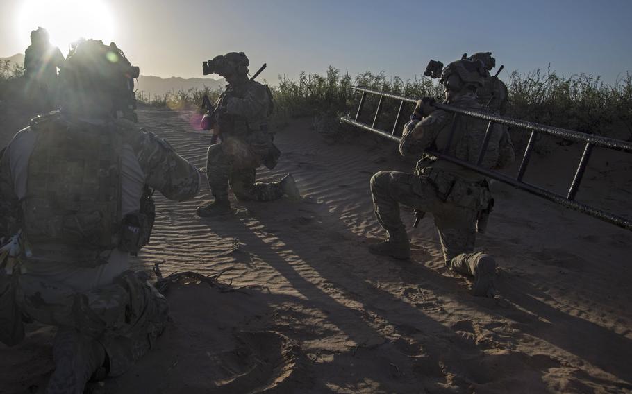 Airmen with the 21st Special Tactics Squadron prepare to infiltrate a compound during training at Fort Bliss, Texas in 2018. The squadron held a ceremony July 24, 2020, to watch the presentation of over 90 awards for the squadron???s most recent deployment in 2019.