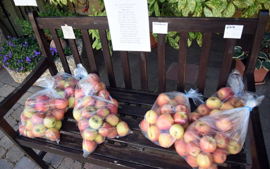 Apples from a nearby orchard were for sale on a bench in Battenberg, Germany, one of many wine villages along the 105-mile Pfalz Wine Trail that begins in Bockenheim, about 28 miles northeast of Kaiserslautern.